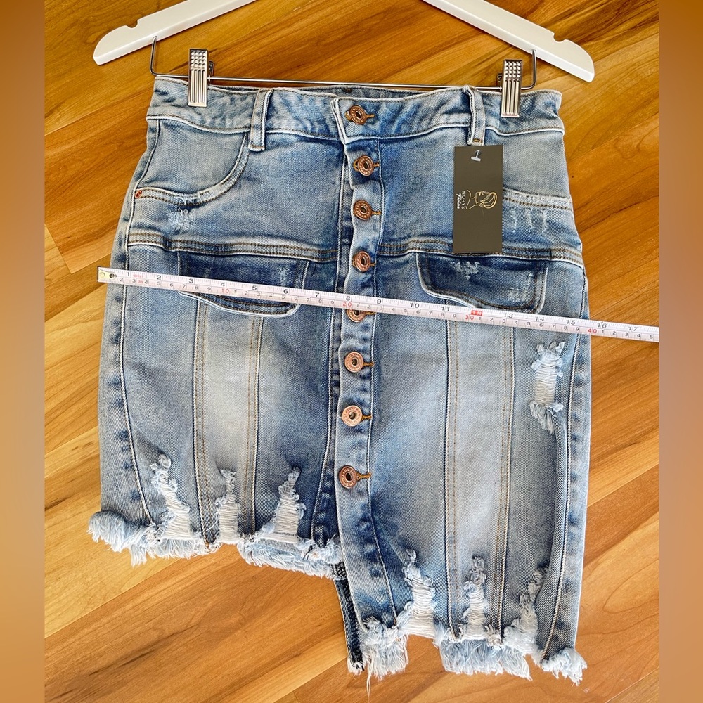 Denim Miniskirt size 10, new with tags.